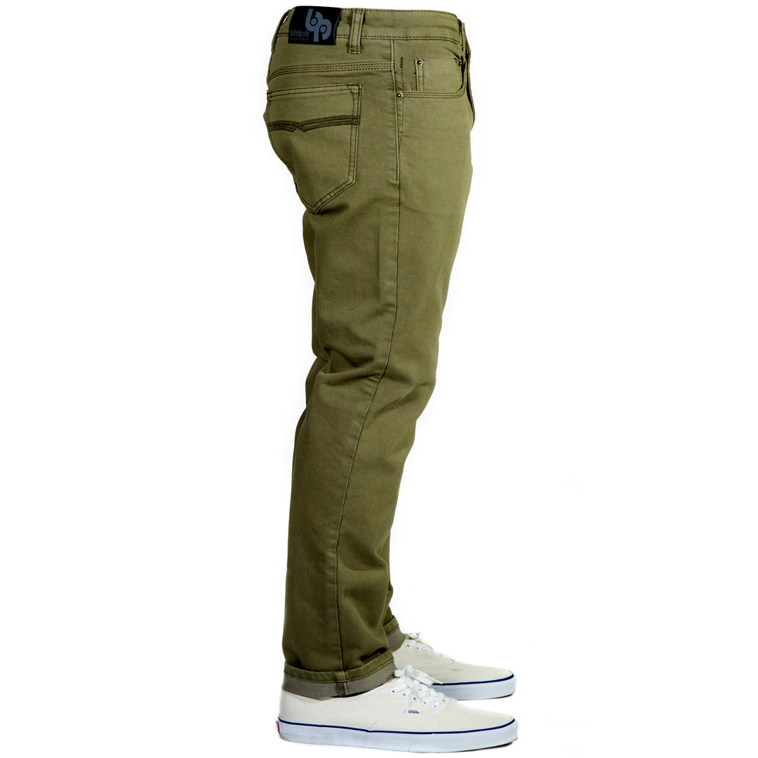 Side view of Olive Green Kush Denim Jeans - Adventure Fit - 4th Gen pants, highlighting their versatile style. 
