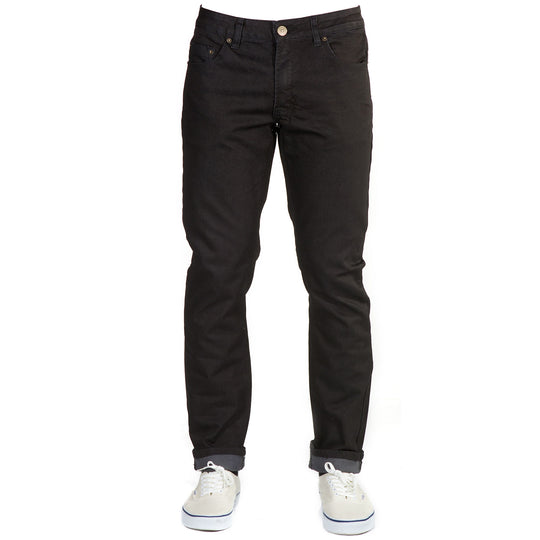 Sleek Front View: Blackout Denim - Slim Fit - 6th Gen Bulletprufe Jeans. Crafted from a mix of organic cotton, ballistic nylon, recycled polyester (sourced from water bottles), and elastane.