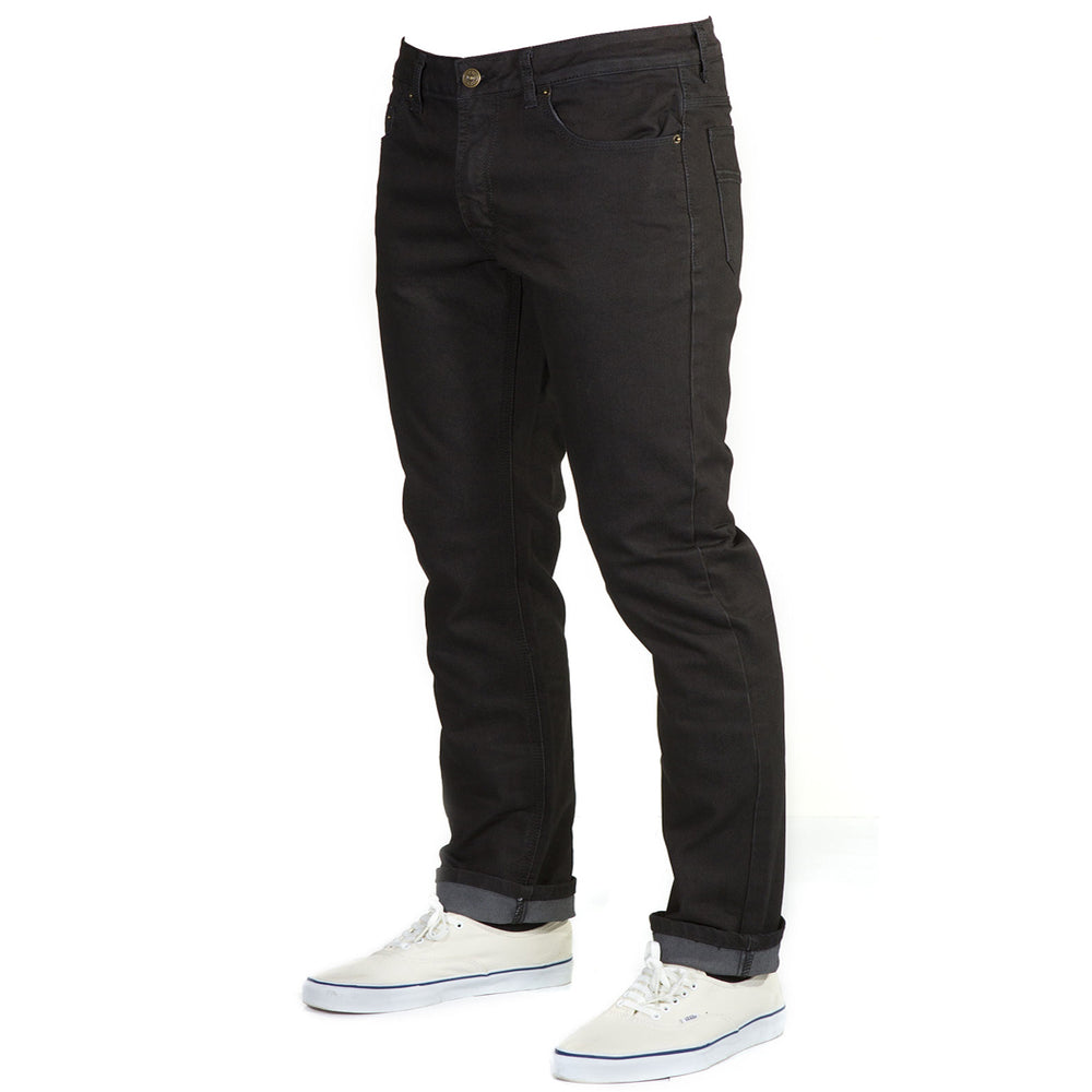 Angled view: Blackout Denim - Adventure Fit - 6th Gen Bulletprufe Jeans. The cotton blend ensures breathability and softness, while the ballistic nylon and PET components enhance strength and resilience.