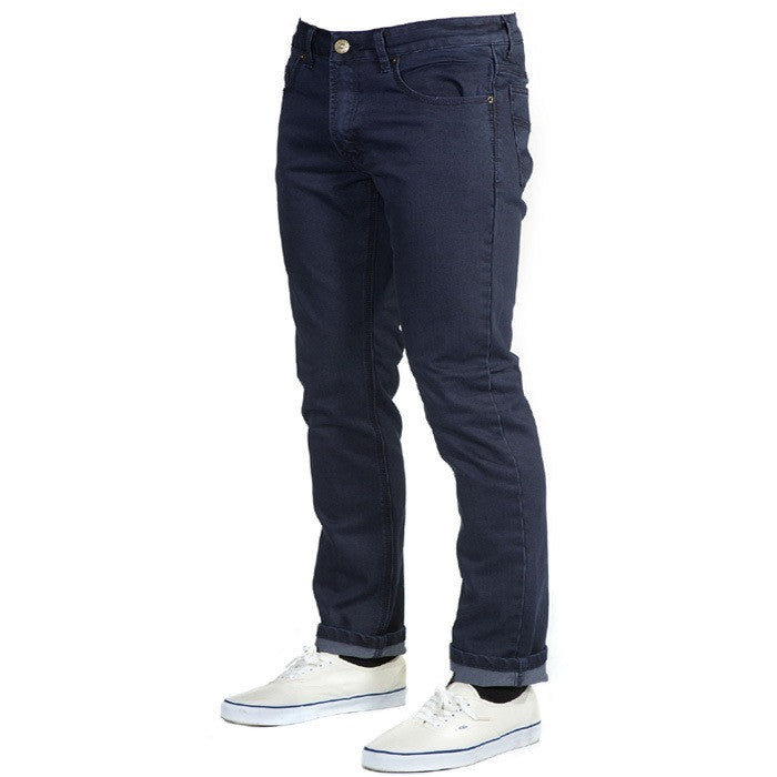 Angled View of Midnight Blue Denim - Adventure Fit - 6th Gen, the perfect combination of durability, comfort, and freedom, empowering you to embark on your next adventure in style.