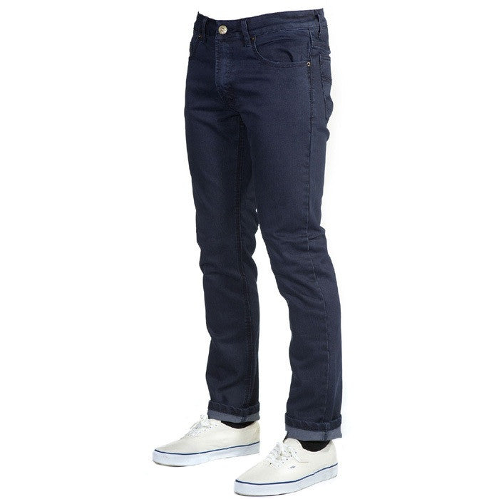 Angled View of Midnight Blue Denim - Slim Fit - 6th Gen, designed with a slim, not skinny, tapered fit that strikes the perfect balance between durability, style, and comfort.