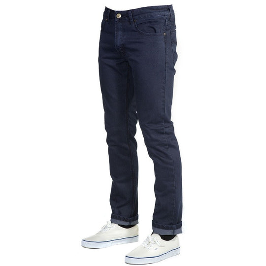 Angled View of Midnight Blue Denim - Slim Fit - 6th Gen, designed with a slim, not skinny, tapered fit that strikes the perfect balance between durability, style, and comfort.