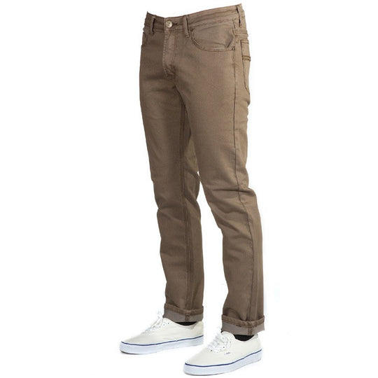 Angled view of Tobacco Brown Denim - Slim Fit - 6th Gen Bulletprufe Jeans, providing a dynamic perspective to showcase their stylish and adaptable design.