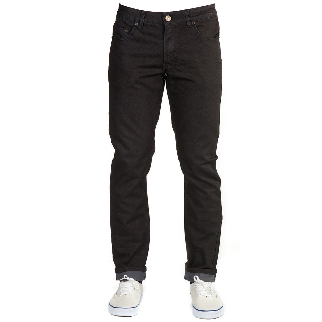 Front view of Black Bulletprufe Jeans - Slim Fit Denim. Proprietary quad-blend fabric with ballistic nylon for ultimate durability. Ultra-rip and abrasion-resistant, high-strength polycore triple stitching. Baby-soft, no-break-in feel, 4-way stretch, anti-stink, never-wrinkle, and a comfort-fit elliptical waistband. 