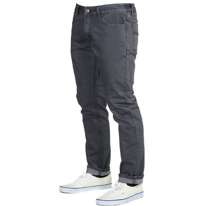 A dynamic perspective view of Slate Gray Denim - Adventure Fit - 6th Gen Bulletprufe Jeans, highlighting their stylish and versatile design. 