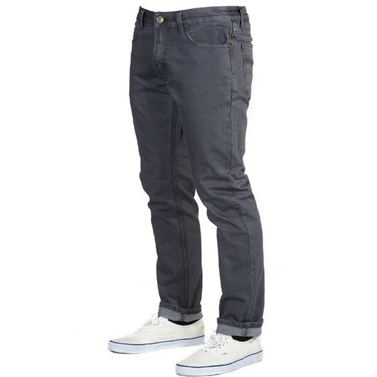 A dynamic perspective view of Slate Gray Denim - Adventure Fit - 6th Gen Bulletprufe Jeans, highlighting their stylish and versatile design. 